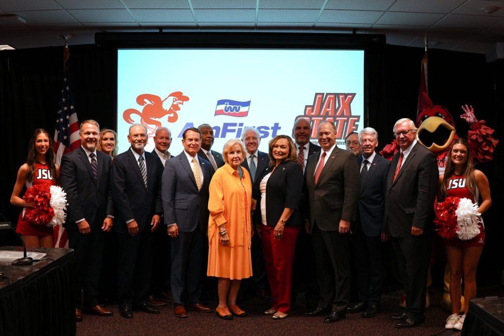 AmFirst Employees and Board of Trustees at Jacksonville State University featured in a photo after signing a multi-year agreement to rebrand the home of their Football Stadium into AmFirst Stadium.
